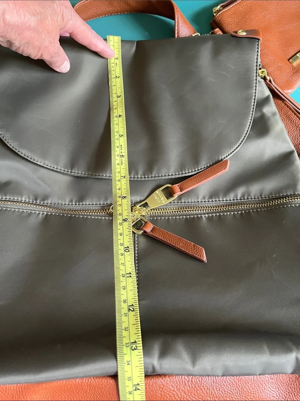 Steve Madden dark green backpack purse with change purse.
